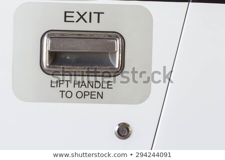 Сток-фото: Airplane Cabin Interior Exit Sign