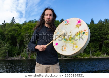 Stock fotó: Man With Long Hair Playing Drums