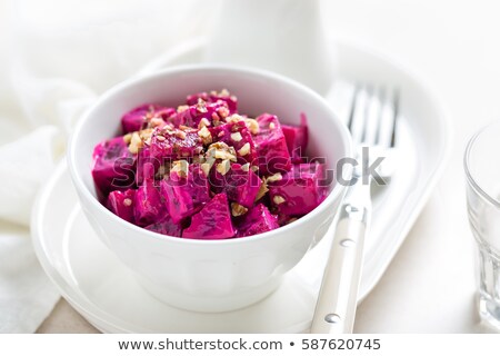 Stockfoto: Beet Vegetable Salad With Yogurt And Walnuts In A Bowl On White Background