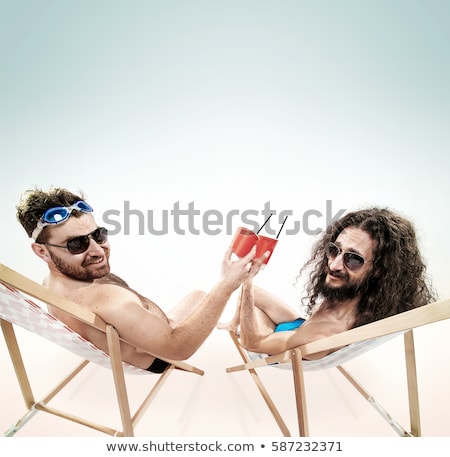 Stok fotoğraf: Two Geek Guys On The Beach