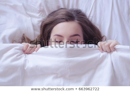 Stockfoto: Beautiful Young Woman Lying Down In Bed And Sleeping Do Not Get Enough Sleep Concept