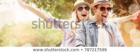 Stockfoto: Couple In Sunglasses Hugging