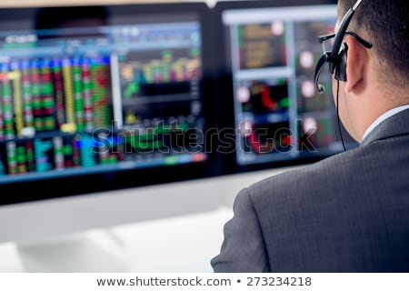 Сток-фото: Financial Broker Looking At The Statistics Of Stock Exchange An