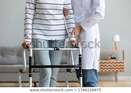 Stockfoto: Crop Doctor Helping Patient With Rehabilitation