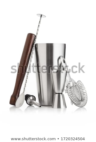 Stockfoto: Cocktail Set With Shaker And Wooden Muddler And Measuring Jigger With Strainer Pourer And Spoon On