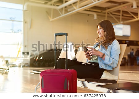 Stock photo: Woman With Laptop Waiting In Airport