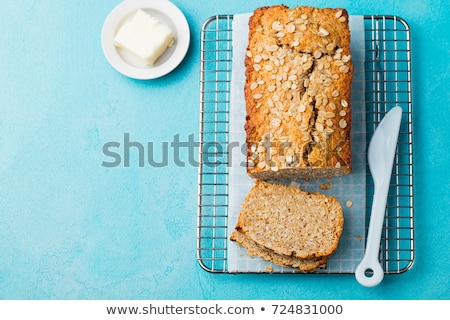 Foto stock: Healthy Vegan Oat And Coconut Loaf Bread Cake On A Cooling Rack Top View Copy Space