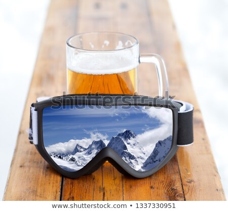 Ski Goggles And Glass Mug With Fresh Cold Beer Сток-фото © Lizard