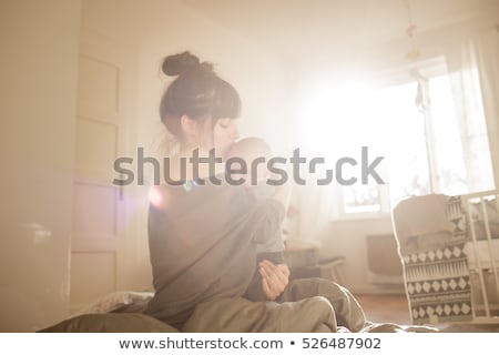 Сток-фото: Mother With Baby On Bed Having Good Time