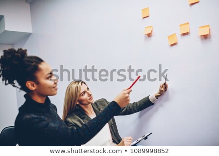 Zdjęcia stock: Coworker Process Two Business Colleague Showing And Discussing