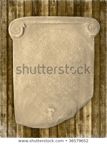 Foto stock: Old Greek Element Attached To The Wall
