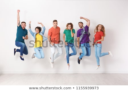 Foto d'archivio: Woman Jumping In Clothing Store