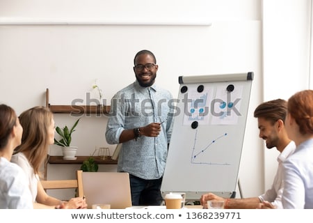 Stock foto: Black Man Teacher Shares Knowledge With Students