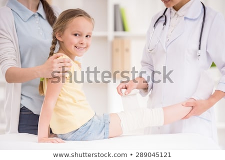 Stok fotoğraf: Little Girl With Bandage On Her Hand