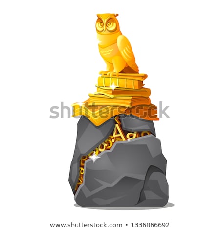 Stok fotoğraf: Golden Owl Statue On Books And Cracked Stone With Letters Made Of Gold Isolated On White Background