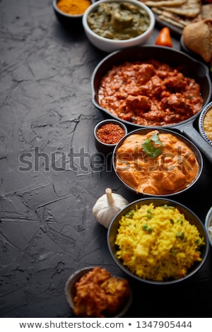 Сток-фото: Composition Of Indian Cuisine In Ceramic Bowls On Stone Table