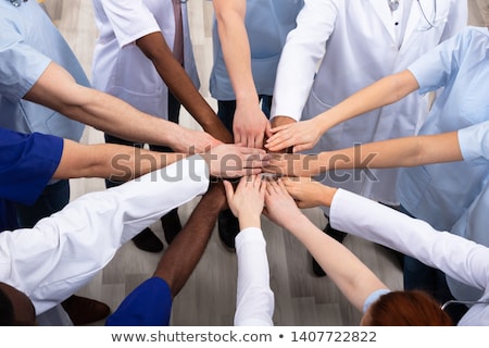 Foto stock: Elevated View Of Doctors Stacking Hands