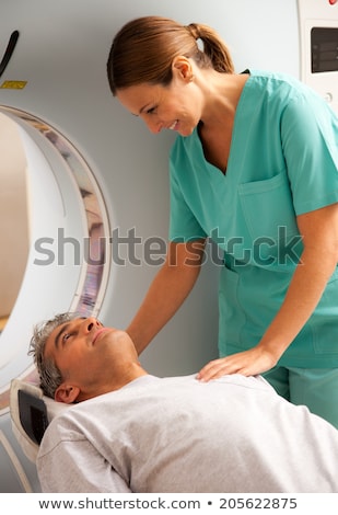 Stok fotoğraf: Female Doctor With The Mri In Hospital