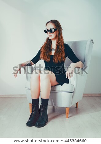 Foto stock: Female Welder With Tattoos