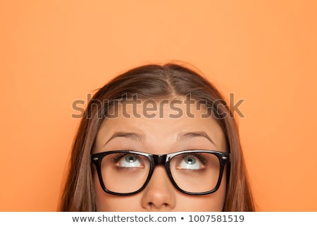 Foto d'archivio: Blonde Girl Looking Up