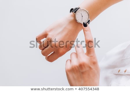 Stock fotó: Young Businessman Looking At Wrist Watch