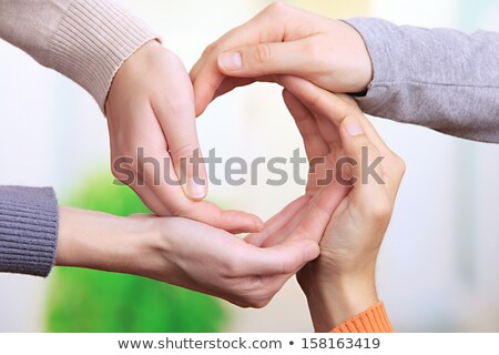 Stock photo: Human Hands Making Circle On Bright Background