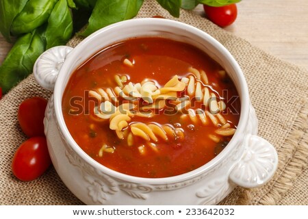 Stockfoto: Bowls Full Of Macaroni And Tomatoes