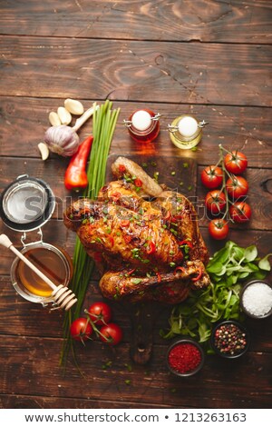 ストックフォト: Roasted Whole Chicken Or Turkey Served With Chilli Pepers And Chive