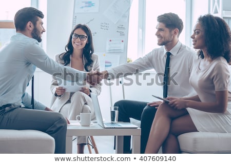 Foto stock: Business People Shaking Their Hands