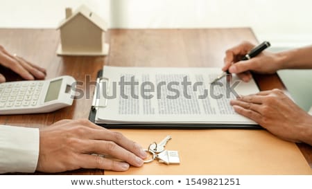 Stock foto: Real Estate Developer Agent And Sign On Document Giving Keys Of