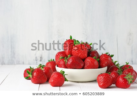 [[stock_photo]]: Bowl Of Fresh Strawberries On The White Wooden Table