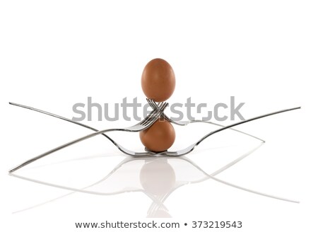 Foto d'archivio: Tow Eggs In Perfect Balance