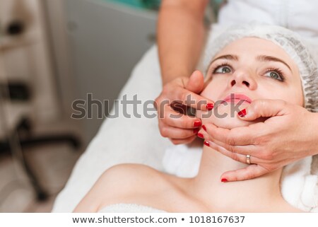 Foto stock: Close Up Of Made Up Woman Having Eyes Closed