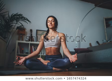 Stockfoto: Portrait Of Beautiful Young Woman Doing Yoga Exercise - Meditati