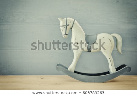 Stockfoto: Rocking Horse Rustic Christmas Background