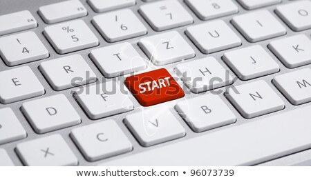 Stock photo: Start Up - Clicking Red Keyboard Button