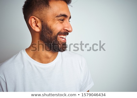 Сток-фото: Side View Portrait Of A Happy Smiling Man Laughing