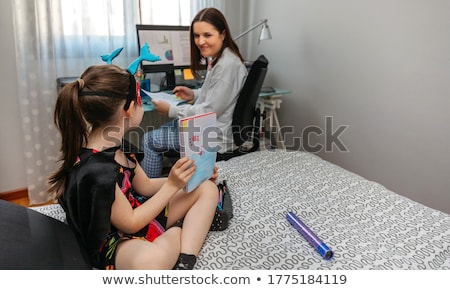 [[stock_photo]]: Woman Telecommuting From Bed