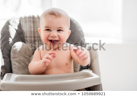Stock photo: Baby Sit On His Chair Waiting For The Diner