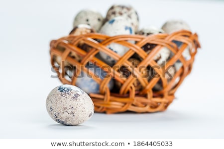 Stock foto: Basket Of White Dotted Easter Eggs In Brown Wicker Basket