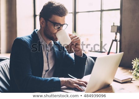 Stock fotó: Creative Man Drinking Coffee In Office