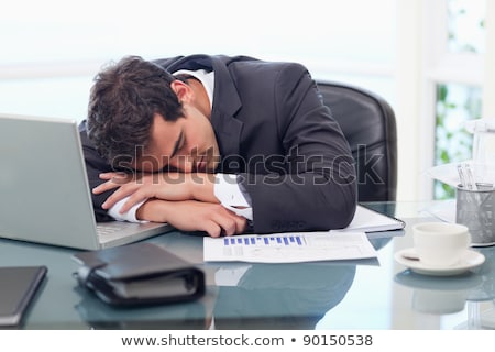 Foto d'archivio: Tired Businessman Sleeping In Office