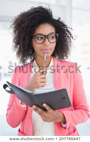 Stock photo: Businesswoman Looking At Her Agenda