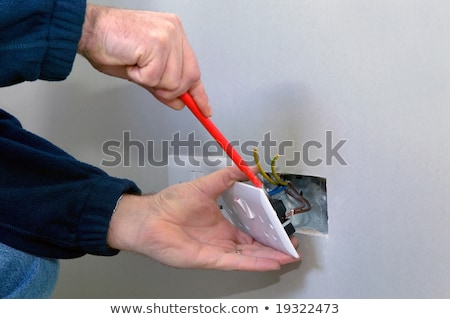 Сток-фото: Electrician Fitting Plug Socket