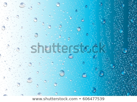 Сток-фото: Flowing Water Drops On The Glass In A Gloomy Autumn Day