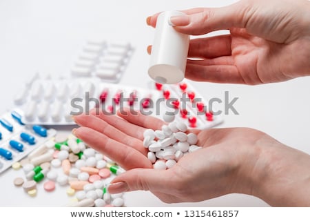 Zdjęcia stock: Female Doctor Hand Full Of Various Pills And Medications