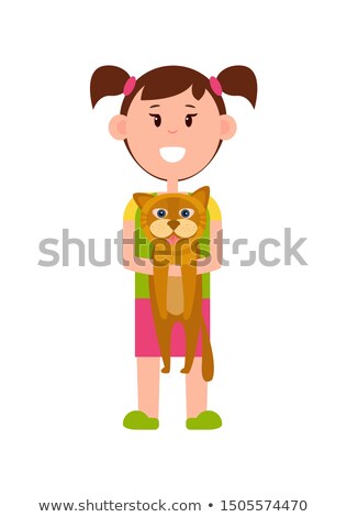 Stockfoto: Little Girl With Ponytails Stands And Holds Cat