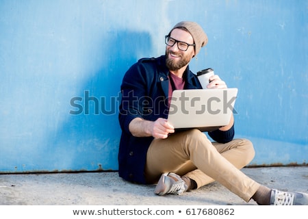 Foto stock: Portrait If A Smiling Man Dressed In Sweater