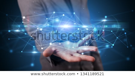 [[stock_photo]]: Man Holding Hologram Projection