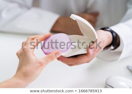 Stock foto: Gynecologist Consulting Woman On Diaphragm Contraception Method